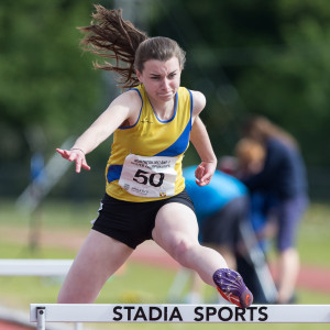 Holly Brannigan winning the U17 100m hurdles